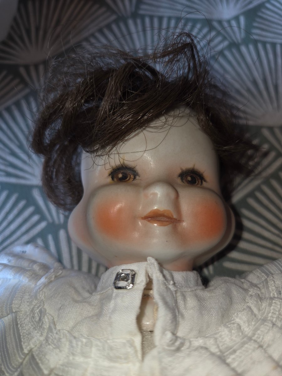 Poupée en porcelaine  tournante  a  4 visages des années 50-photo-3