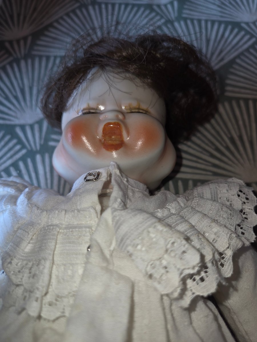Poupée en porcelaine  tournante  a  4 visages des années 50-photo-4