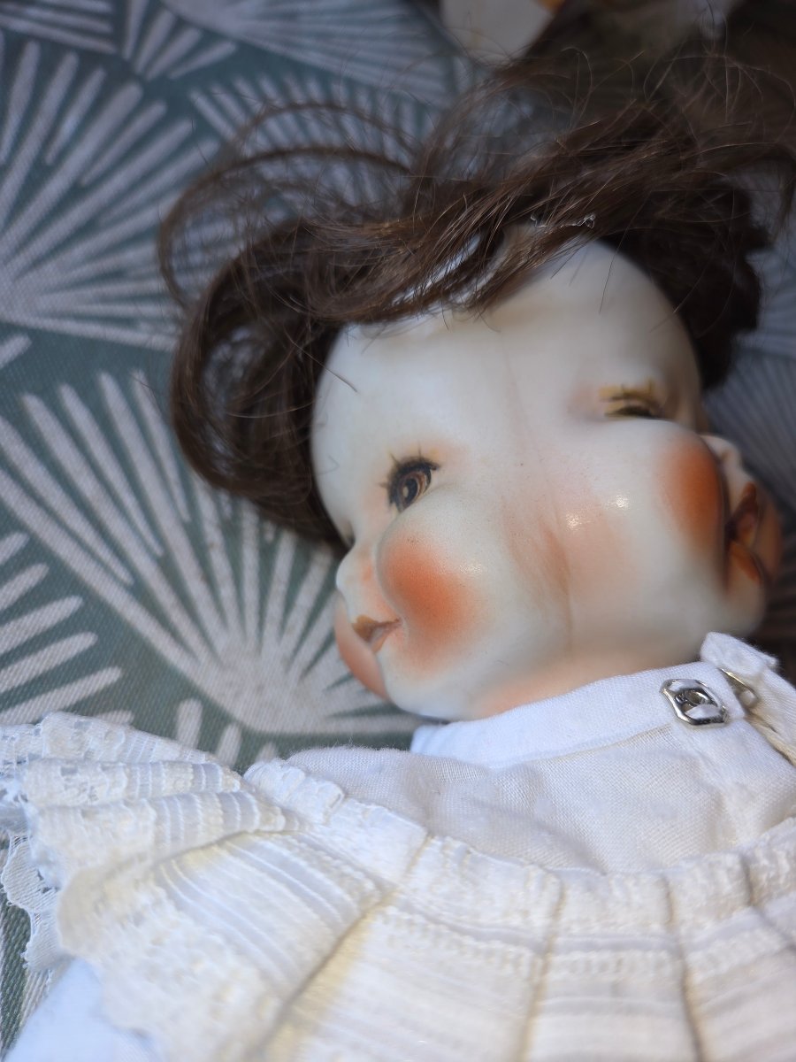 Poupée en porcelaine  tournante  a  4 visages des années 50-photo-2