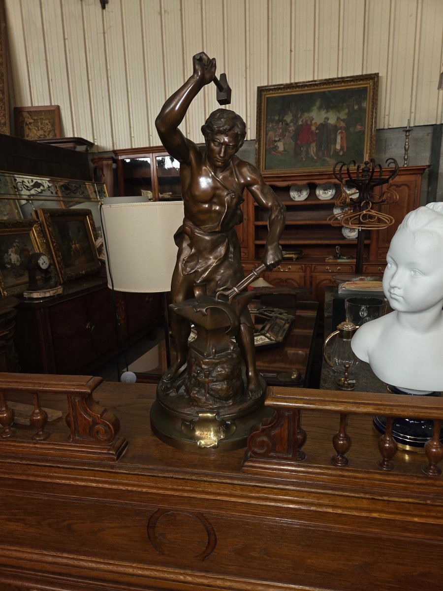 Bronze Sculpture Titled *le Travail* By Adrien étienne Gaudez (1845–1902), Depicting A Blacksmith At Work.