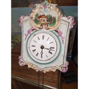 Pendule forêt noire façade en faience 