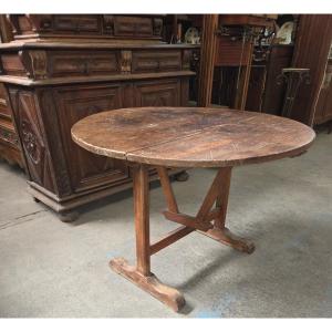 Table vigneronne en chene de la deuxième partie du 19ème 