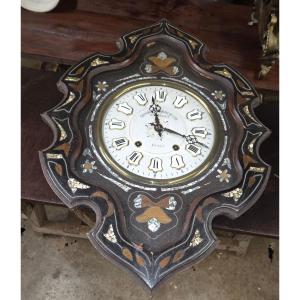 Pendule dit oeuil de beuf d'époque Napoléon III 