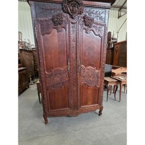 Armoire Normande tres richement sculptée datée 1840 mesurant 246cm