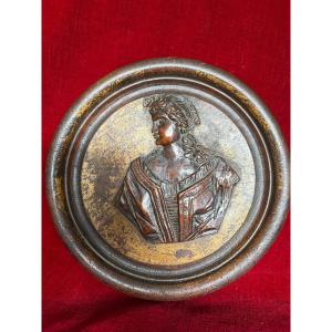 Bust Of A Woman In A Circular Frame