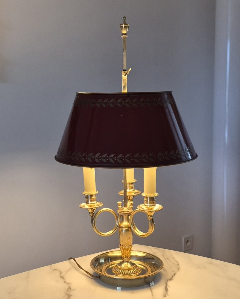 Hot Water Bottle Lamp With Hunting Horns And A Red Lampshade