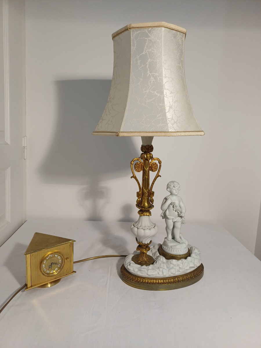 Bronze And Biscuit Lamp With Cherub Sculpture 