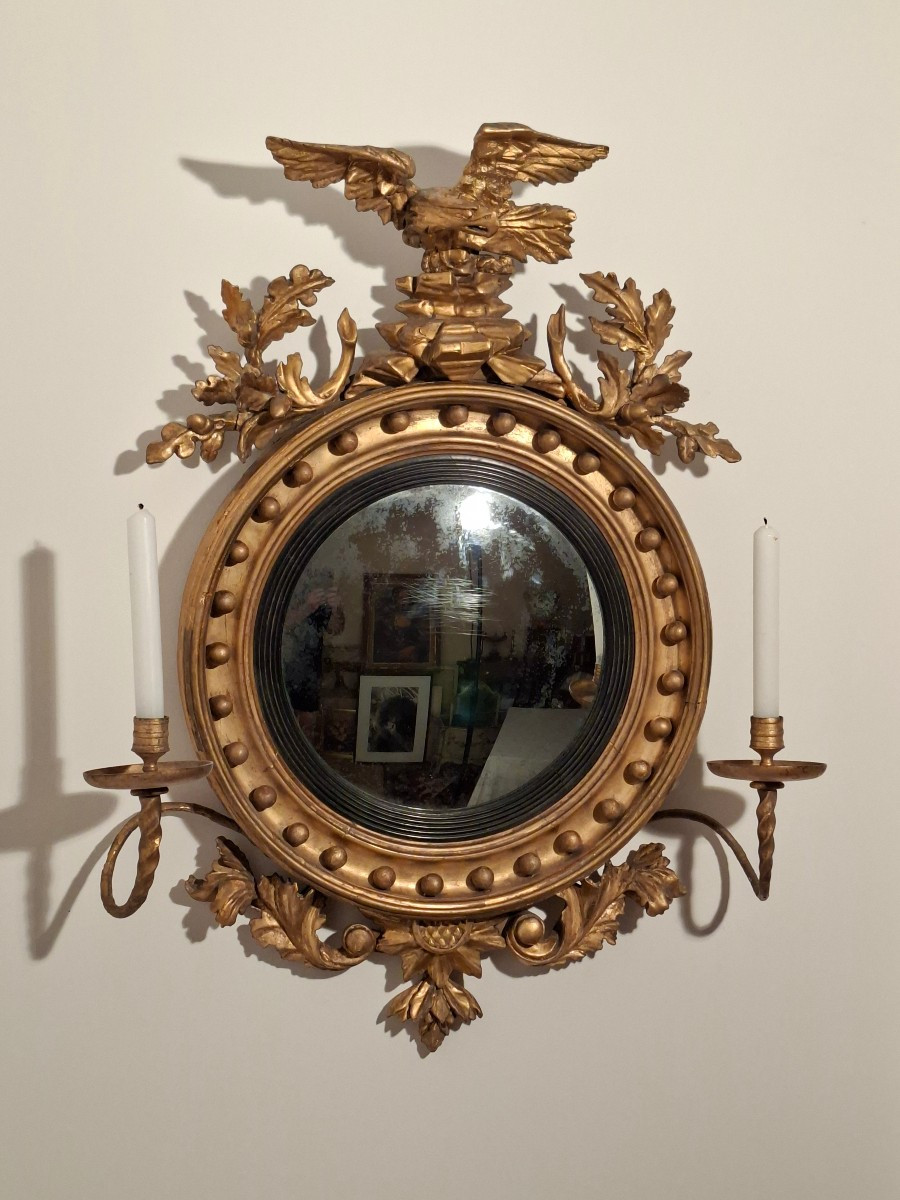 Miroir dit de Sorcière en bois Doré surmonté d'un Aigle