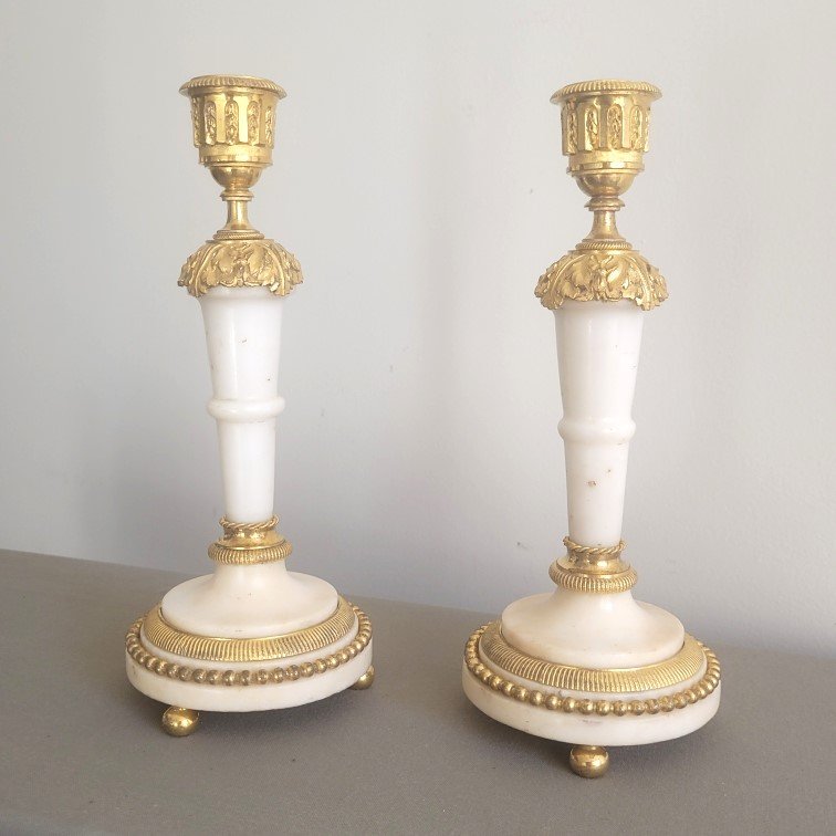 Pair Of Louis XVI-era Candlesticks.