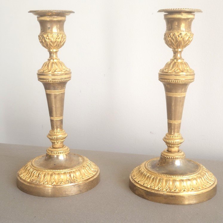 Pair Of Louis XVI-era Candlesticks.