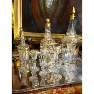 Cristallerie  du XVIIIè, époque Louis XVI, 12 pièces avec plateau. 