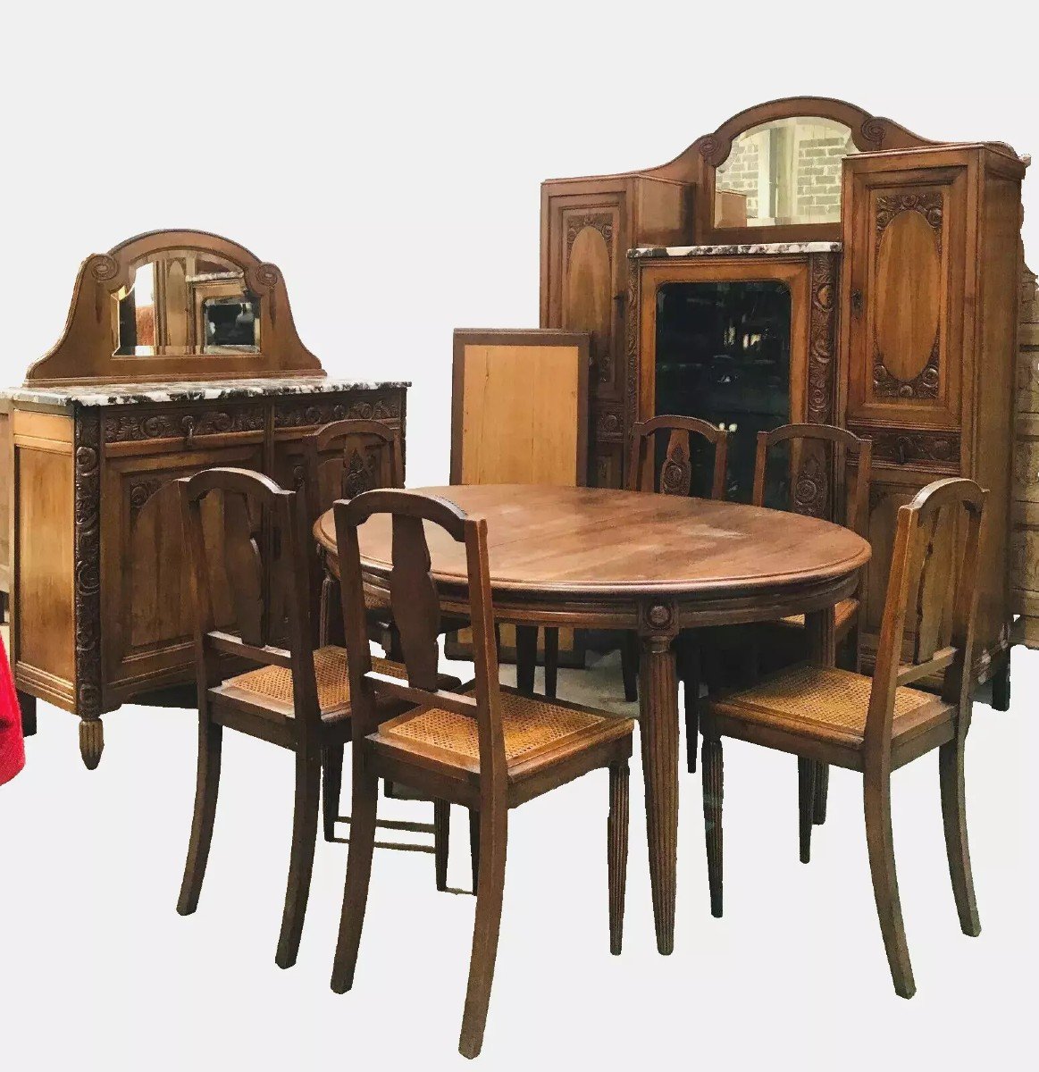 Finely Carved Art Deco Solid Walnut Dining Room. 20th Century.