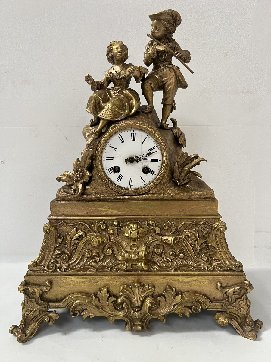 Pendule Romantique en bronze doré XIX siècle