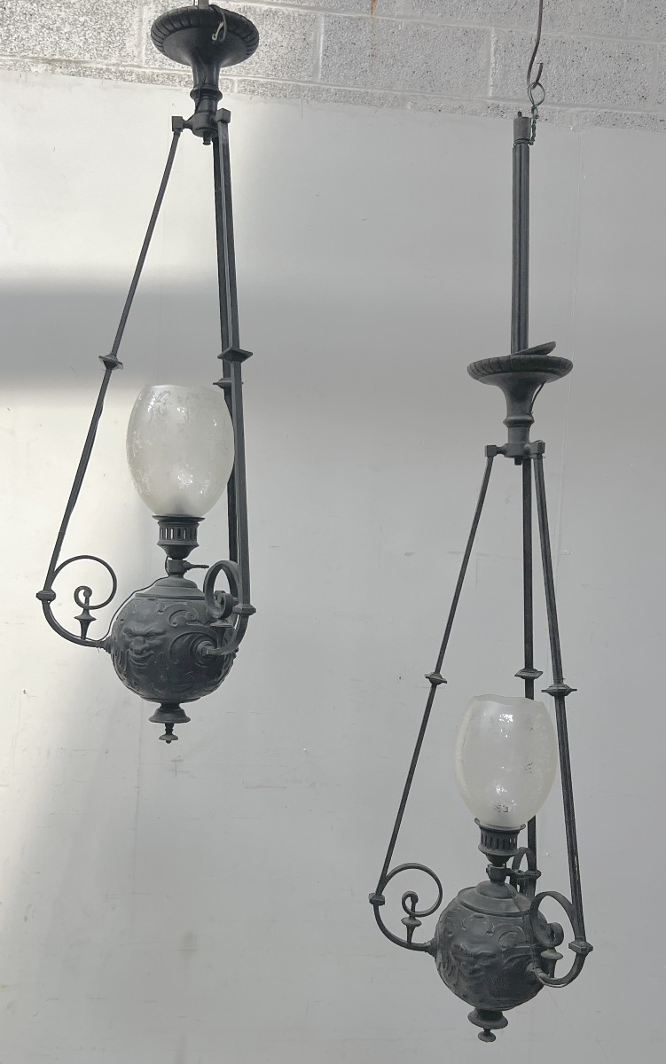 Paire de lustres boules en bronze patiné XIX siècle