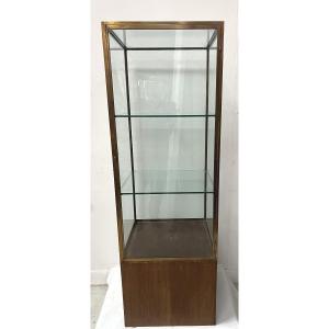 Vitrine de magasin en laiton posé sur un caisson en chêne XX siècle 