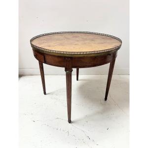 Table bouillotte de style Louis XVI en bois de placage XX siècle