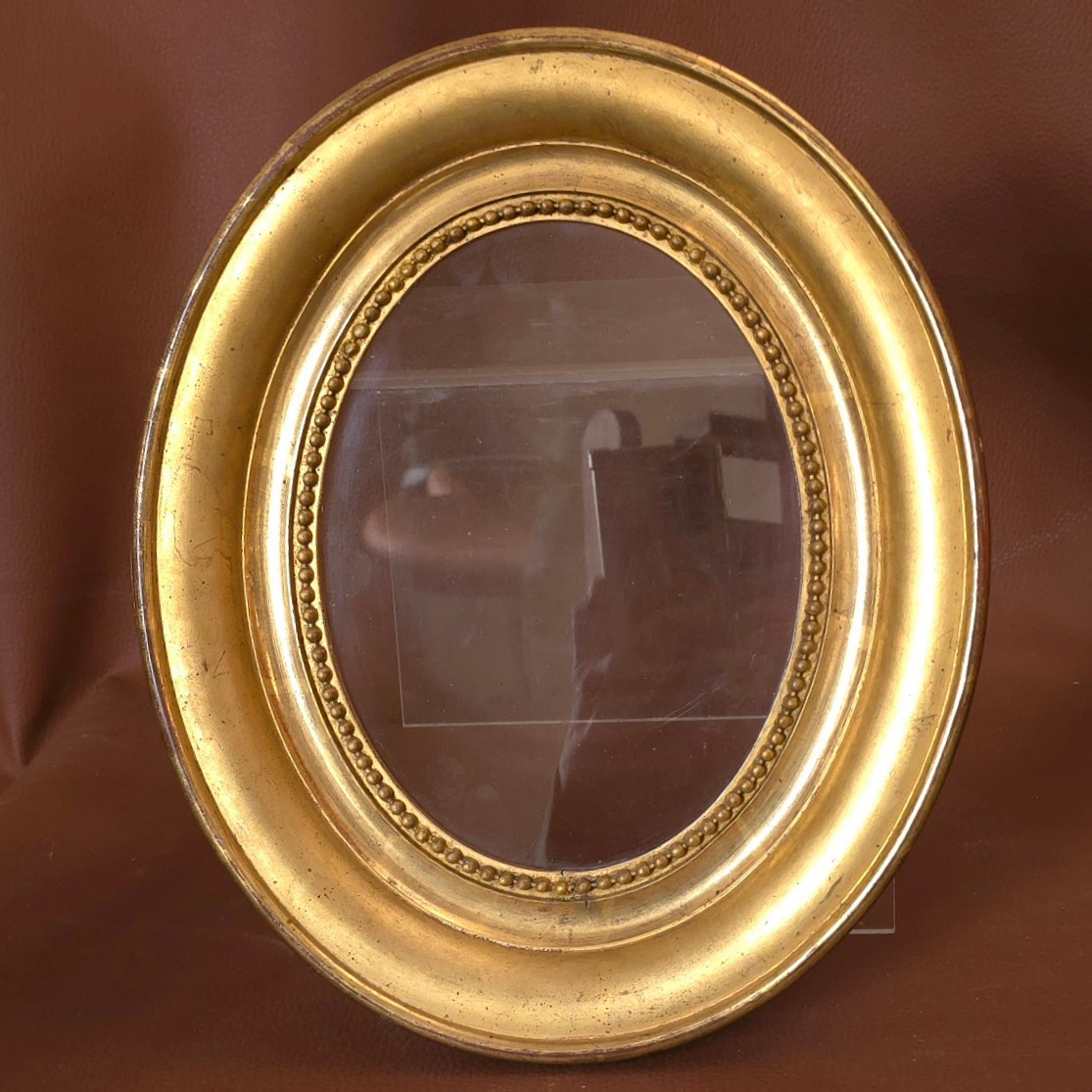 Cadre doré ovale Napoléon III  feuillure : 21,5 x 16,5 cm