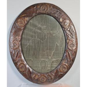 Oval Art Nouveau Frame In Embossed Leather With Floral Decoration; Visible Dimensions: 39.8 X 29.8 Cm