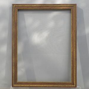 Cadre début XXe bois et stuc doré feuillure : 29,4 x 22,2 cm