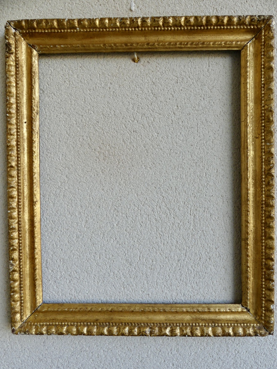 Cadre en bois doré et sculpté, XVII ème.