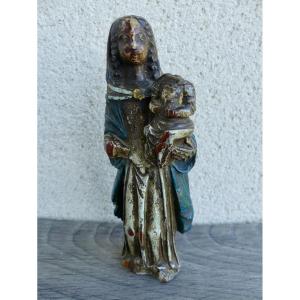 Petite vierge à l'enfant en bois polychrome et sculpté, XVII ème.