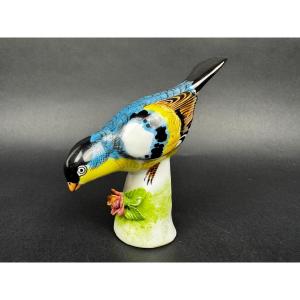 Figurine porcelaine oiseau polychrome sur socle fleuri vintage