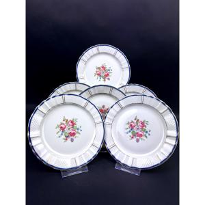 Bernardaud Limoges suite de six assiettes à dessert décor floral et filet bleu/or