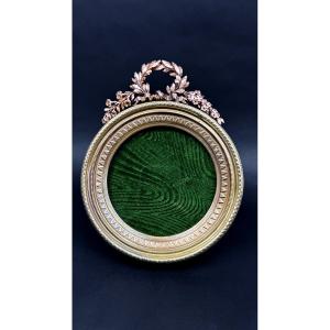 Grand cadre porte-photo en bronze doré                                                 2367,034