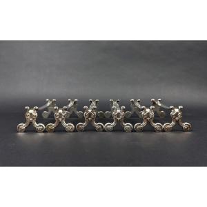 Christofle, suite de 6 porte-couteaux modèle coquille