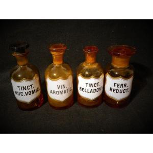 Series Of 4 Pharmacy Jars With Enamel Labels