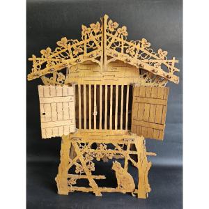 Cage à oiseau en bois découpé