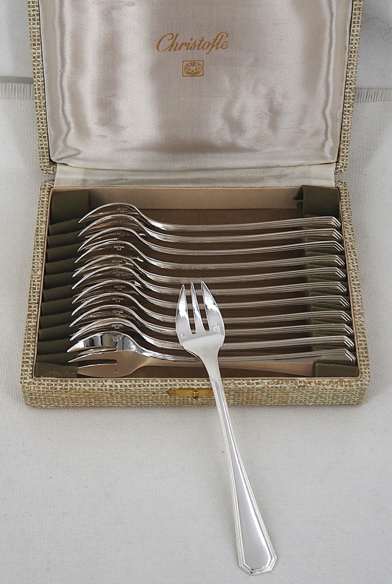 Christofle modèle América, 12 fourchettes à huitres, métal argenté, Art déco.