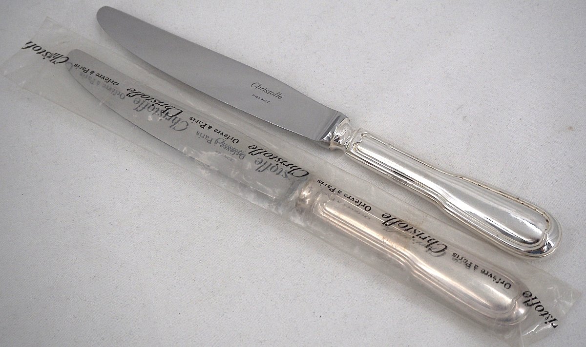 Christofle modèle Chinon, 10 couteaux de table, dont 9 intacts sous blisters scellés.-photo-2