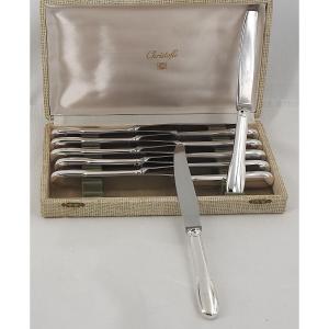 Christofle modèle Cluny, 12 couteaux de table en métal argenté, en excellent état.