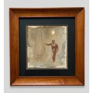 Figure Holding A Rope