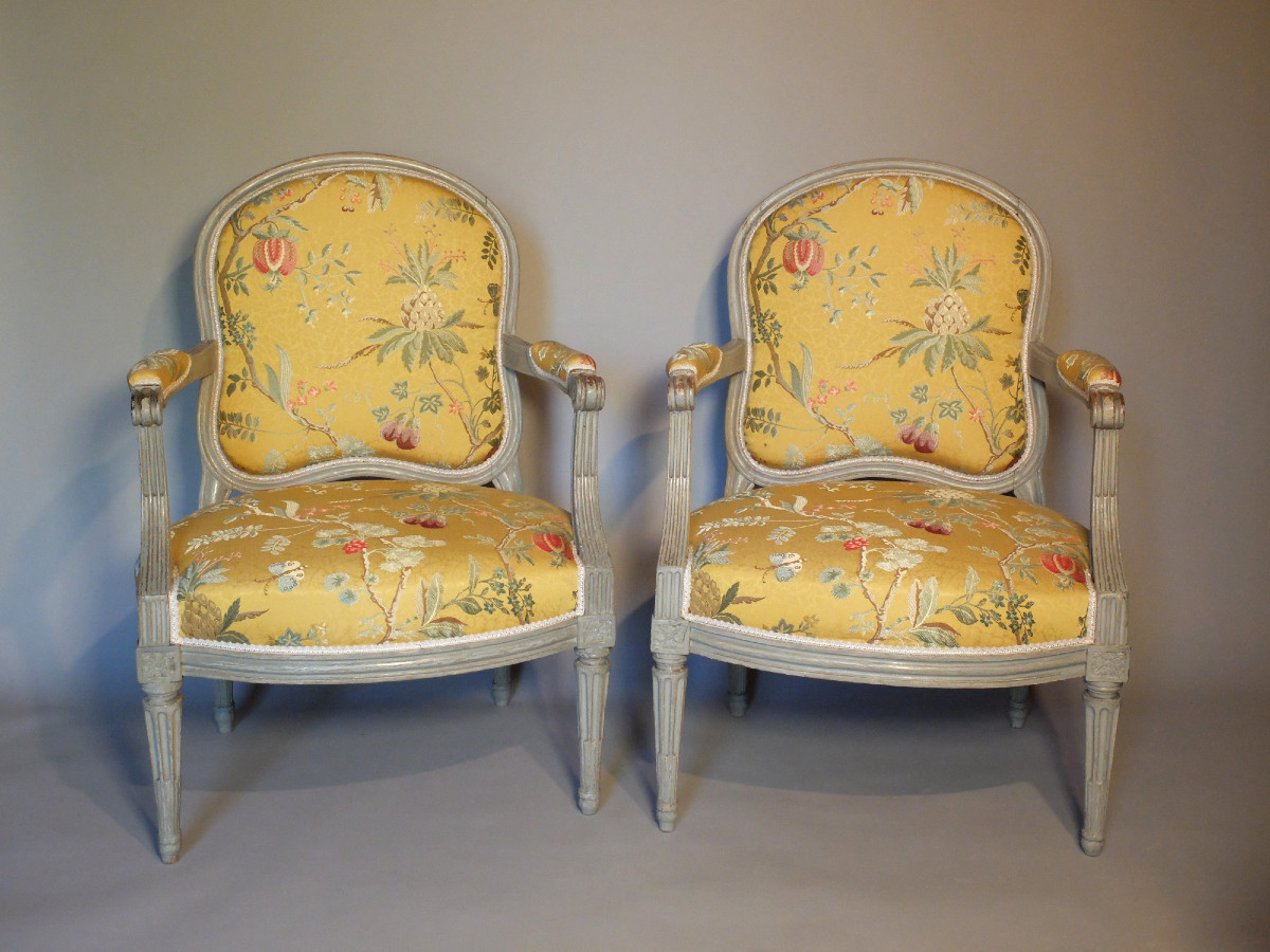 Paire de fauteuils à la Reine d'époque Louis XVI par Claude Chevigny