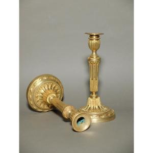 Pair Of Louis XVI Candlesticks In Gilded Bronze