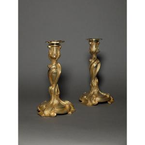 Paire de bougeoirs rocailles d'après Meissonnier