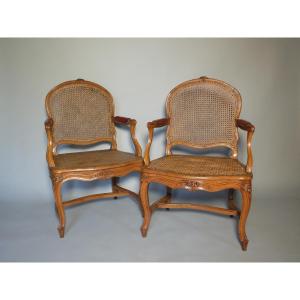 Paire de fauteuils cannés estampillés Pierre Moreau