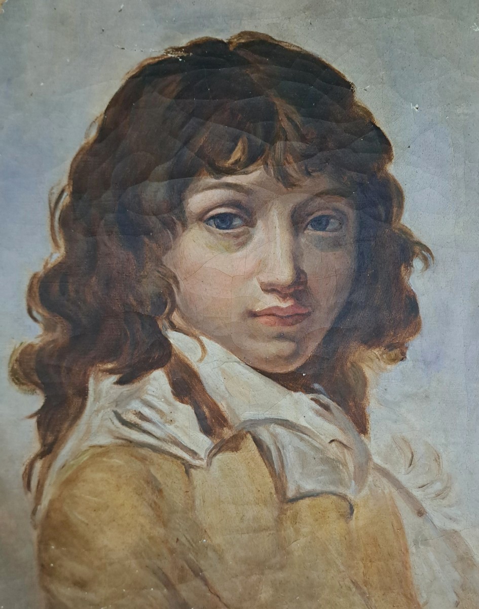 Portrait d'un jeune gar&ccedil;on aux cheveux longs