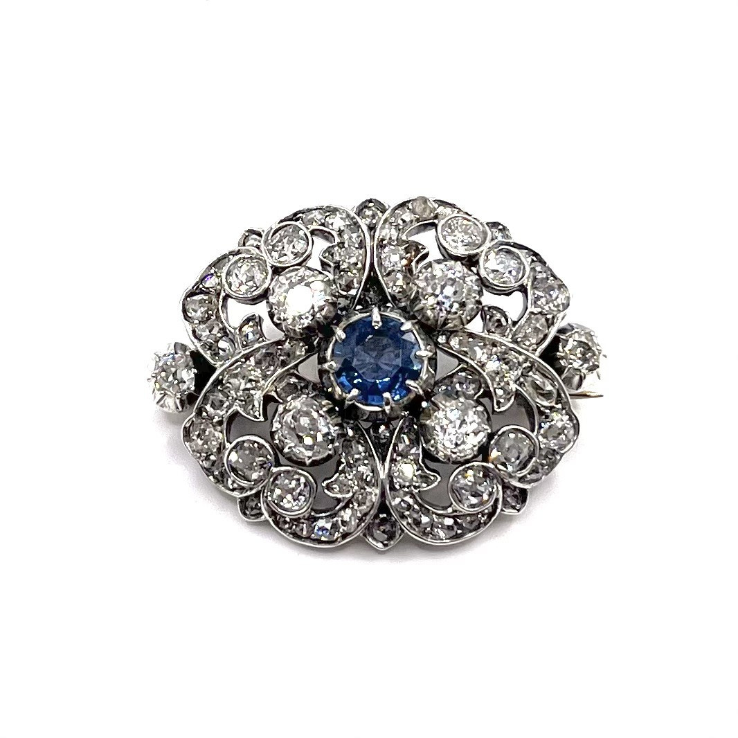 0880. Antique Brooch Decorated With Diamonds And Blue Sapphire