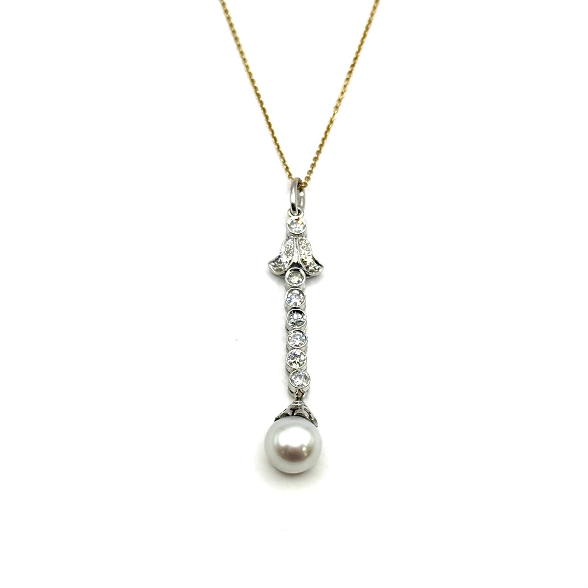 5140. Vintage White Gold Pendant With A Diamond And A Pearl