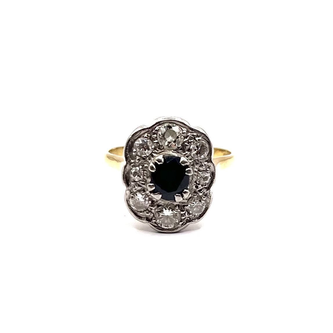 1186. Gold Ring With Diamonds And A Blue Sapphire