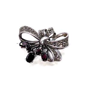 1548. Silver Brooch In The Shape Of A Bow Set With Garnets And Marcasites