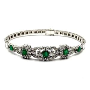 1516. White Gold Bracelet With Diamonds And Emeralds