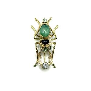 5007. Broche vintage en or en forme de scarabée, ornée de grenat, d’émeraude et de pierre ornem