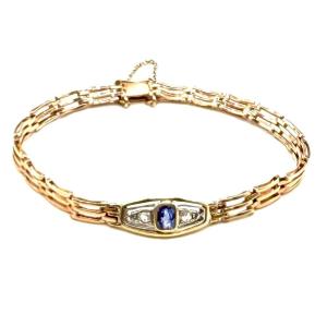 5152. Art Deco Gold Bracelet, Set With A Diamond And A Sapphire.