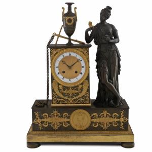 French Clock In Gilded And Patinated Bronze