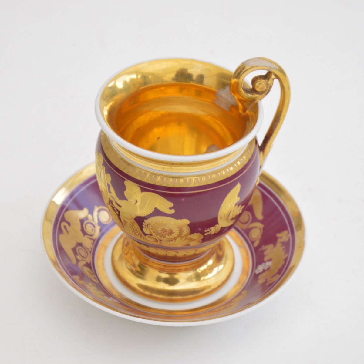 Empire Cup And Saucer In Empire Porcelain With Golden Decor Cherubs, Swans, Circa 1820