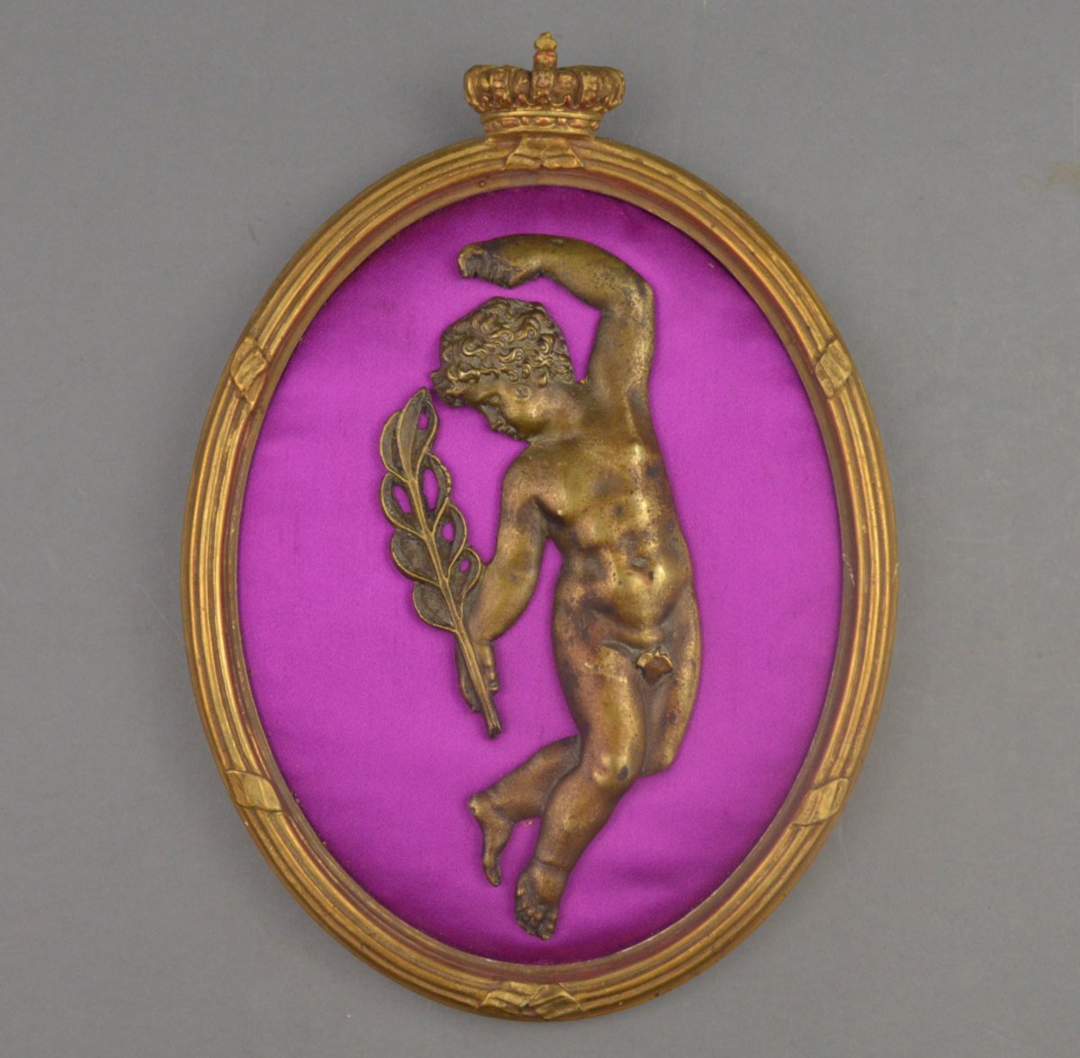 Patinated Bronze Bas-relief Representing A Boy Holding A Laurel Mounted On A Tissue